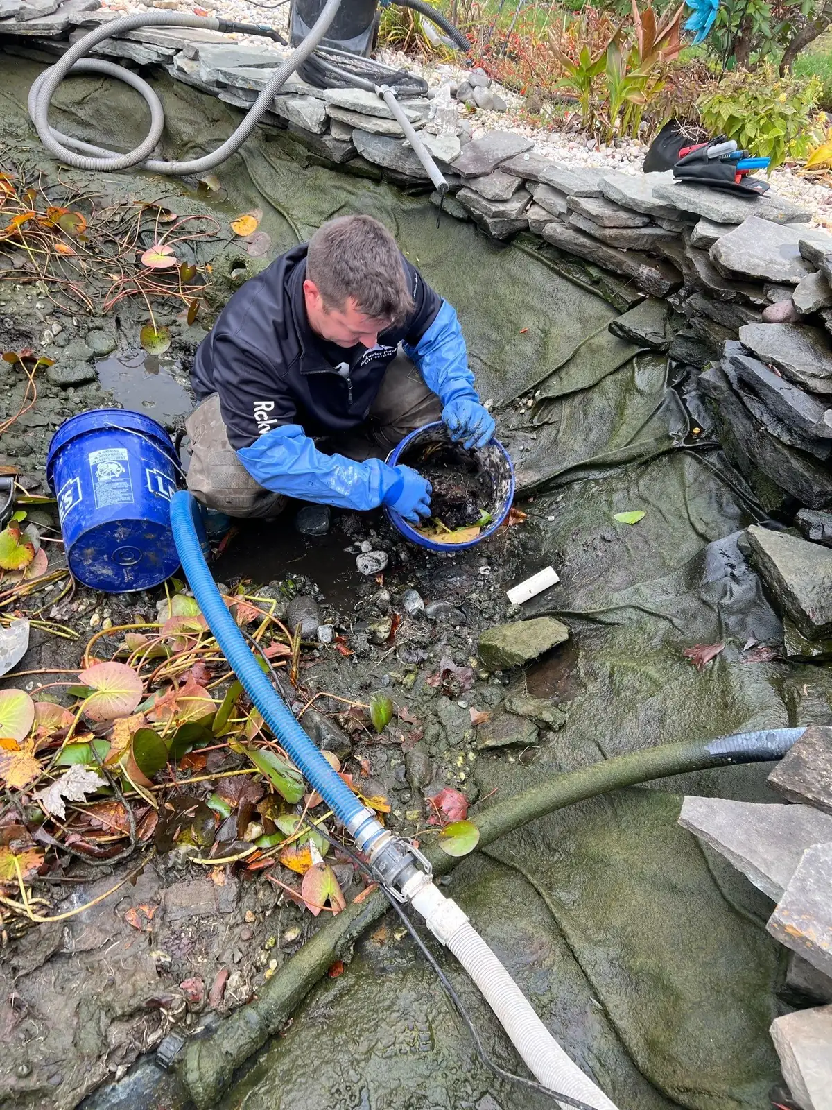 Pond cleanout service removing debris and restoring water quality