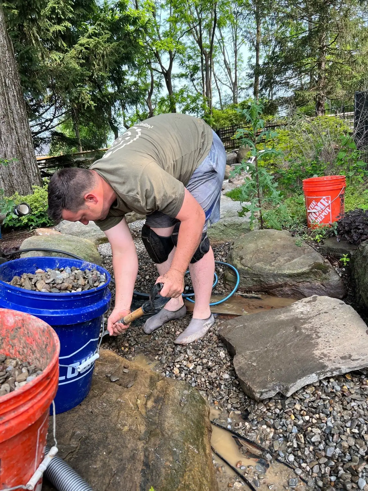 Before and during pond cleanout showing water quality improvement