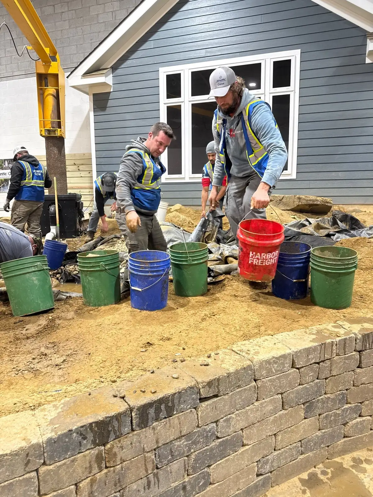 Rock Water Ponds team working on a pond project