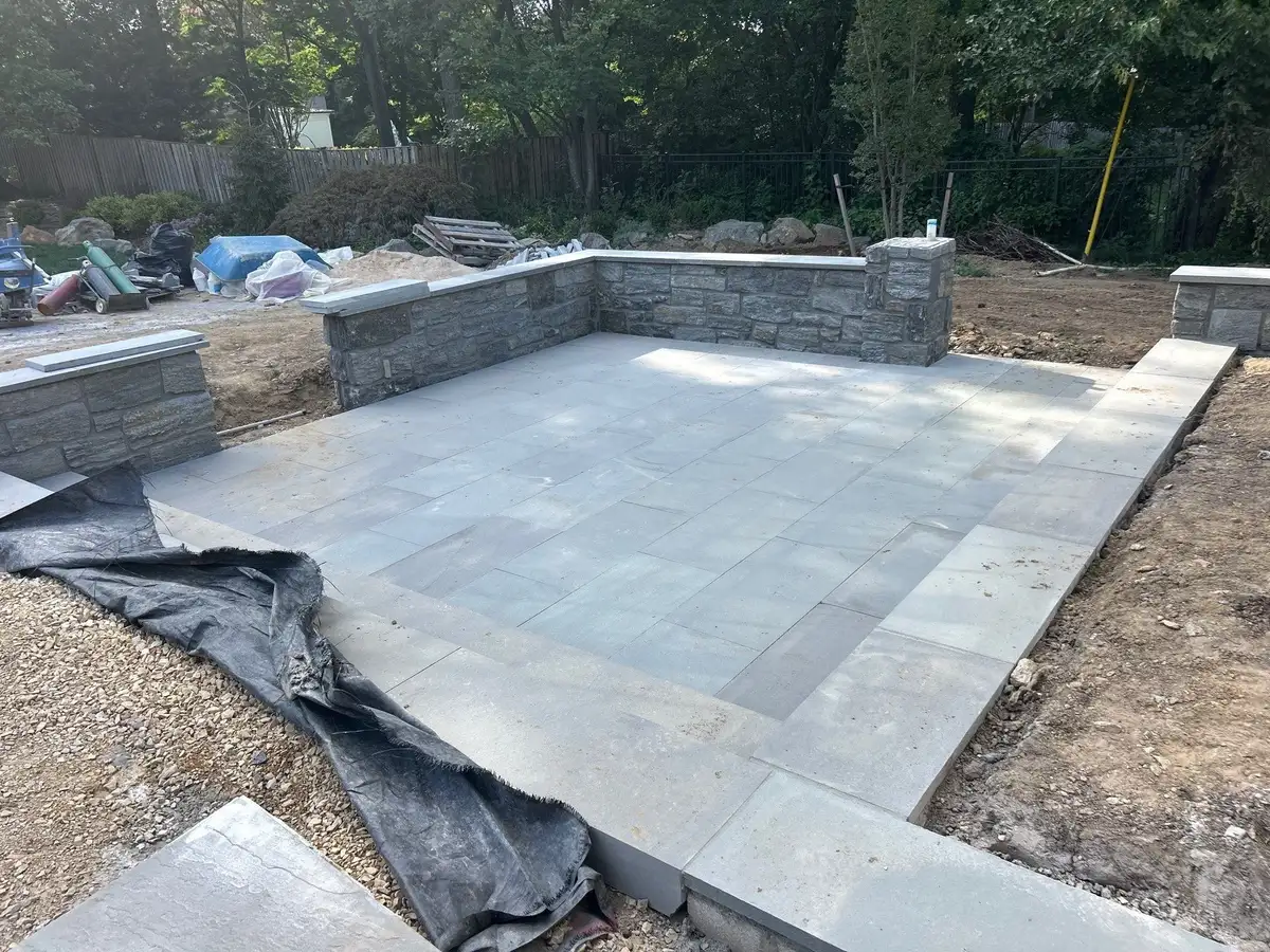LED-illuminated waterfall at night with underwater and spotlight lighting