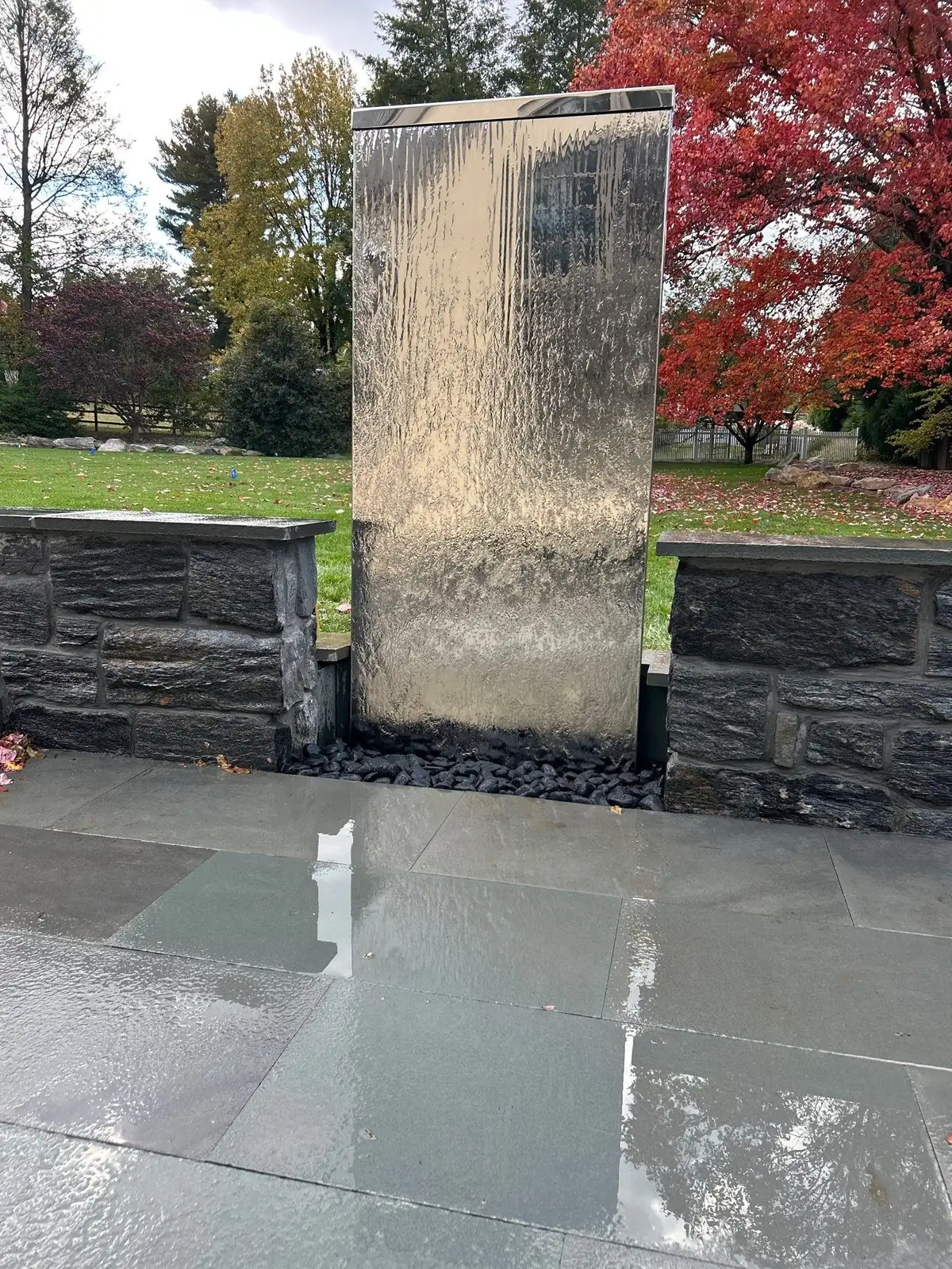 Pondless waterfall cascading over natural boulders